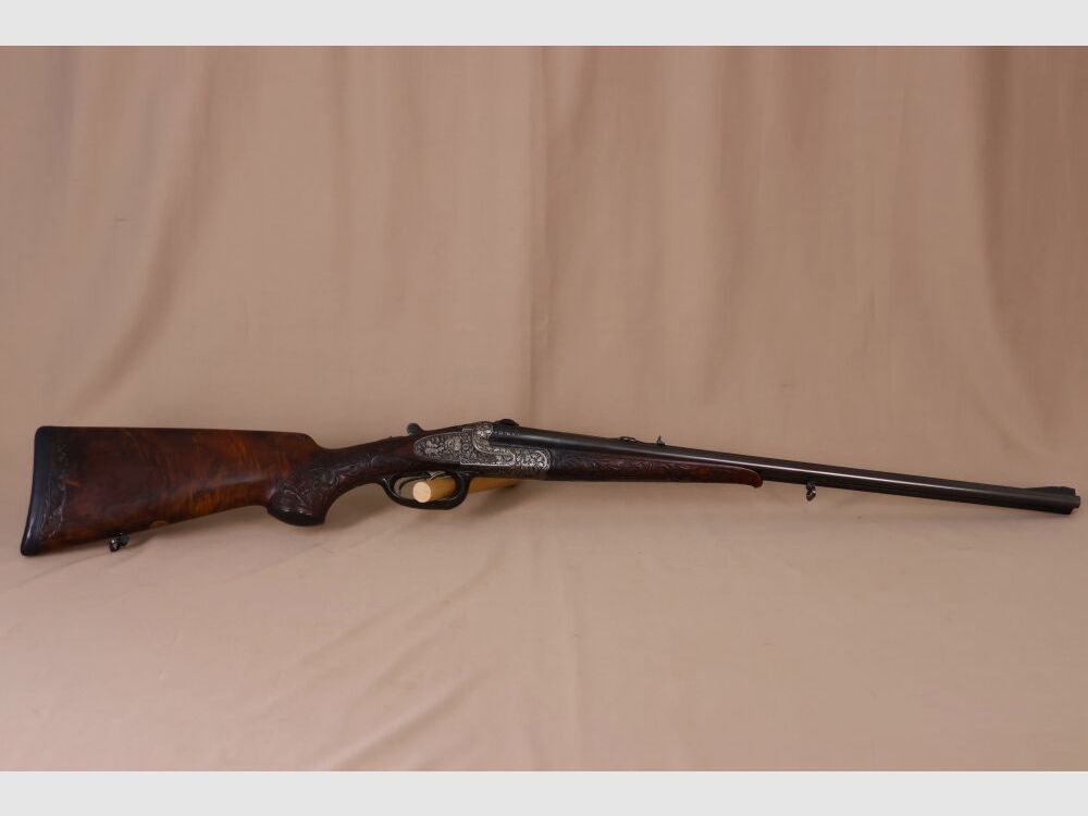 Ten FFM double rifle // Exclusive // Ejector! // Great engraving and walnut wood!!