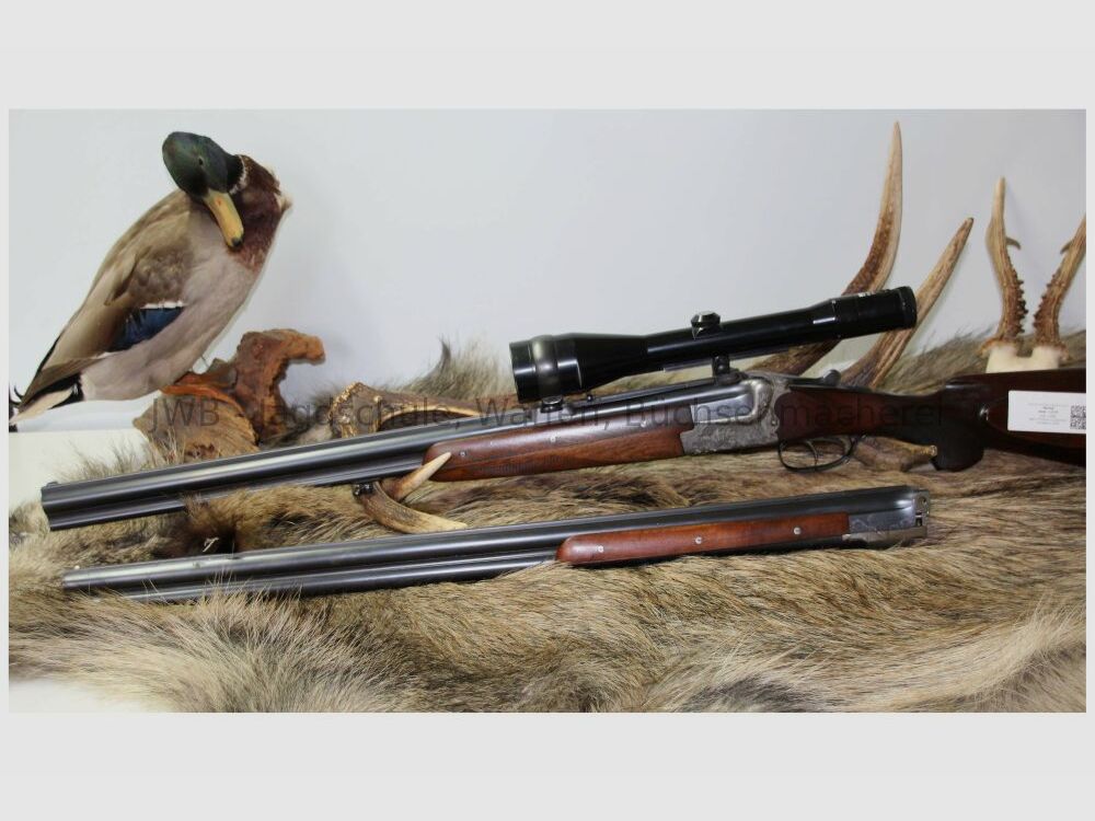 Merkel double-barreled shotgun with interchangeable double-barrel and variable sight 12/70; 7x57R