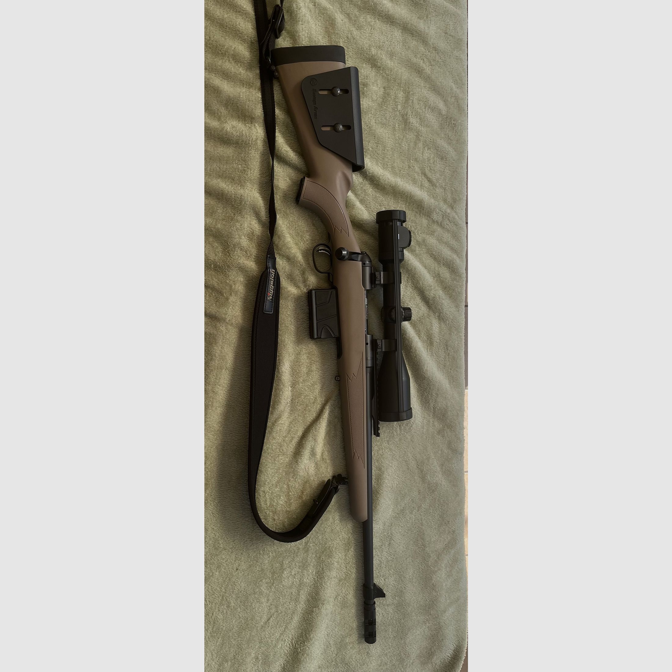 Savage Arms Scout 11 with Zeiss Conquest DL