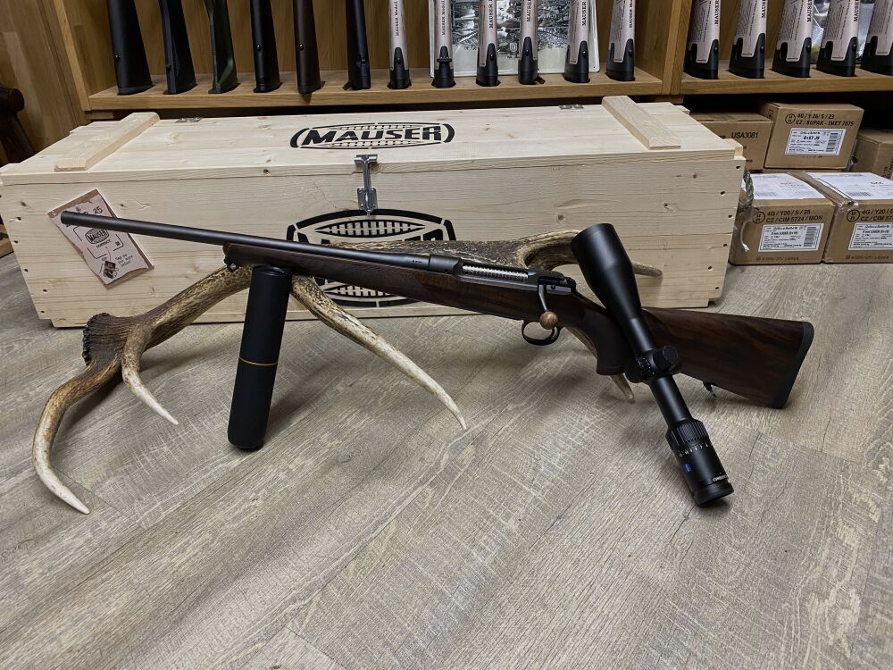 Sauer 101 Artemis, left, with Zeiss Conquest V4 3-12x56