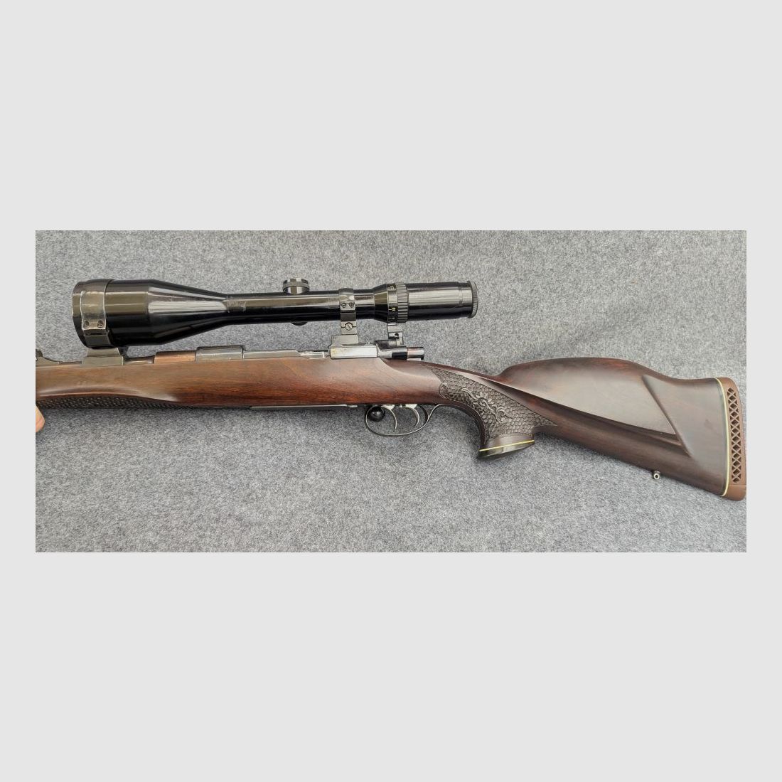 Mauser Mod 98 with animal engraving and stalking safety