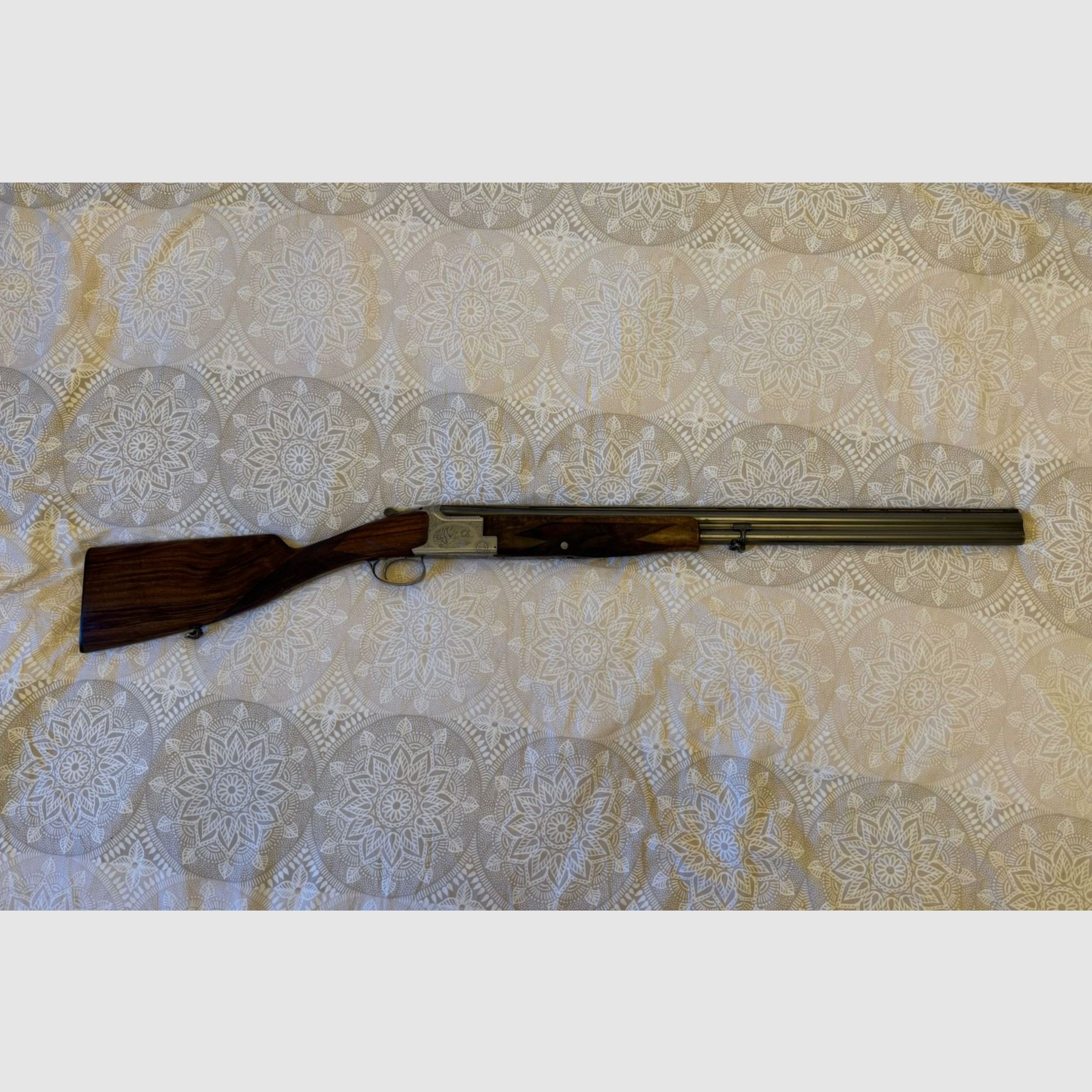 FN Browning B25 "Game Gun" B2G – Hand engraving, cal. 12/70 over-and-under shotgun