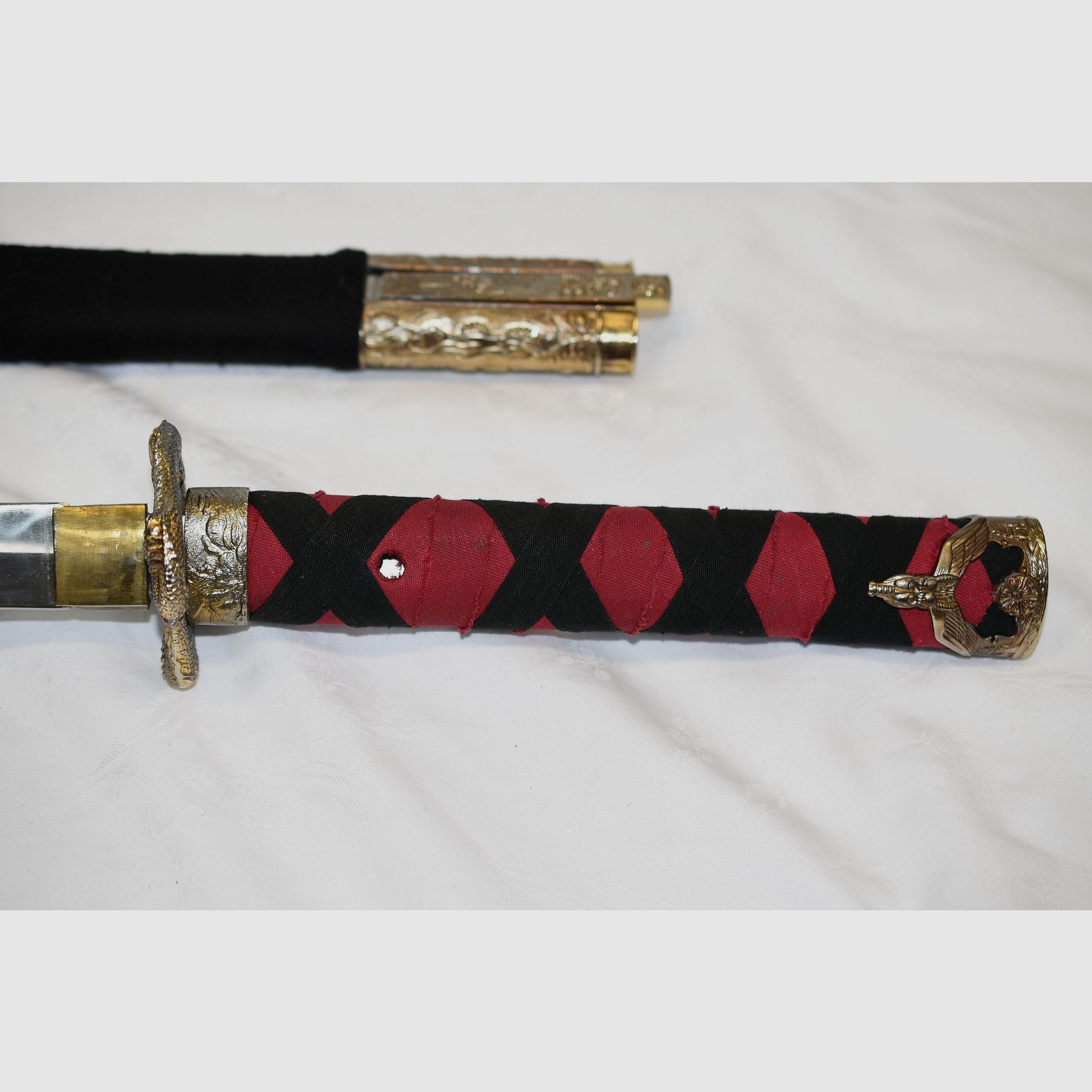 Japans zwaard, Samurai, Katana, Wakizashi, met Menuki op de greep