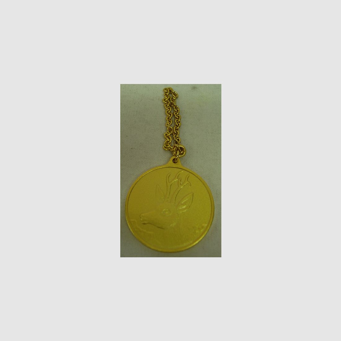 Medaglia di caccia per capriolo d'oro - 40 mm con anello e occhiello dorati