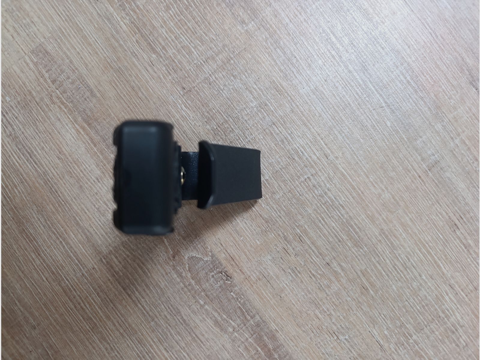 Bevestiging gehoorbescherming riemhouder oorkap