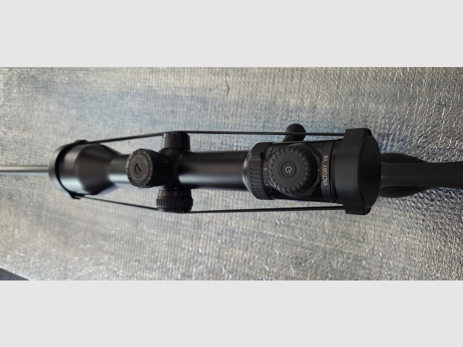 Sauer 404 Synchro XT (Sistema de acero) con mira telescópica y silenciador