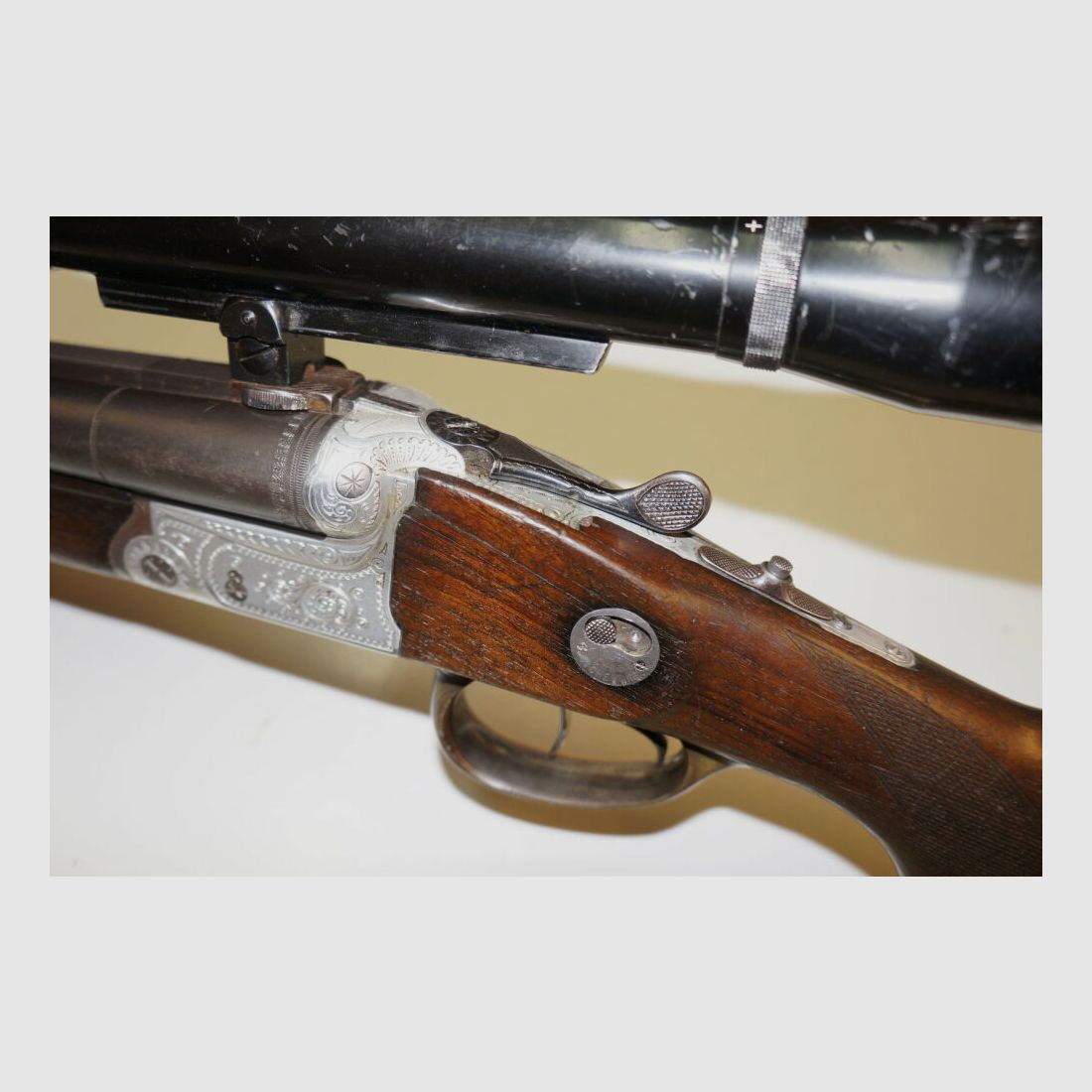 Krieghoff Drilling, Krieghoff, Kal.7x57R / Kal.16/70, mit GECO Zielfernrohr und schönen Gravuren