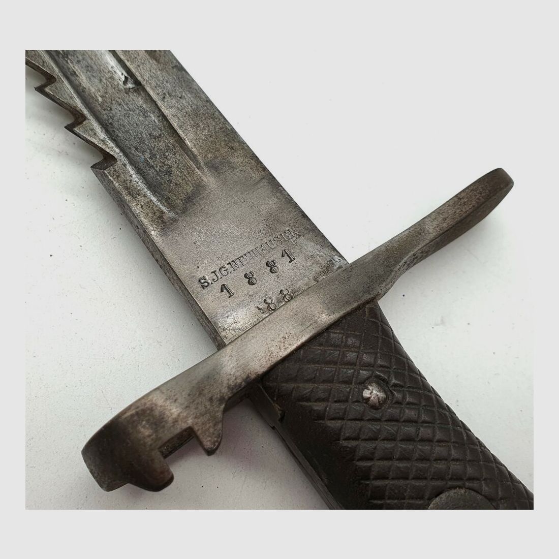 Vetterli original Vetterli bayonet with saw teeth and green fur on the scabbard