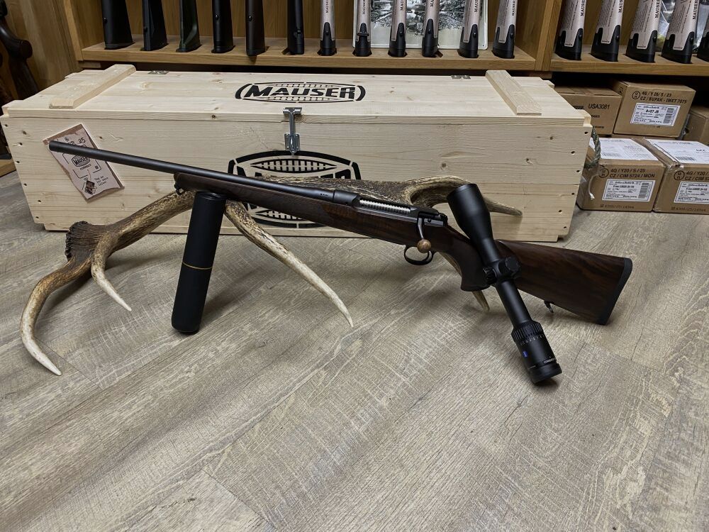 Sauer 101 Artemis, left, with Zeiss Conquest V6 2-12x50 M, with rail