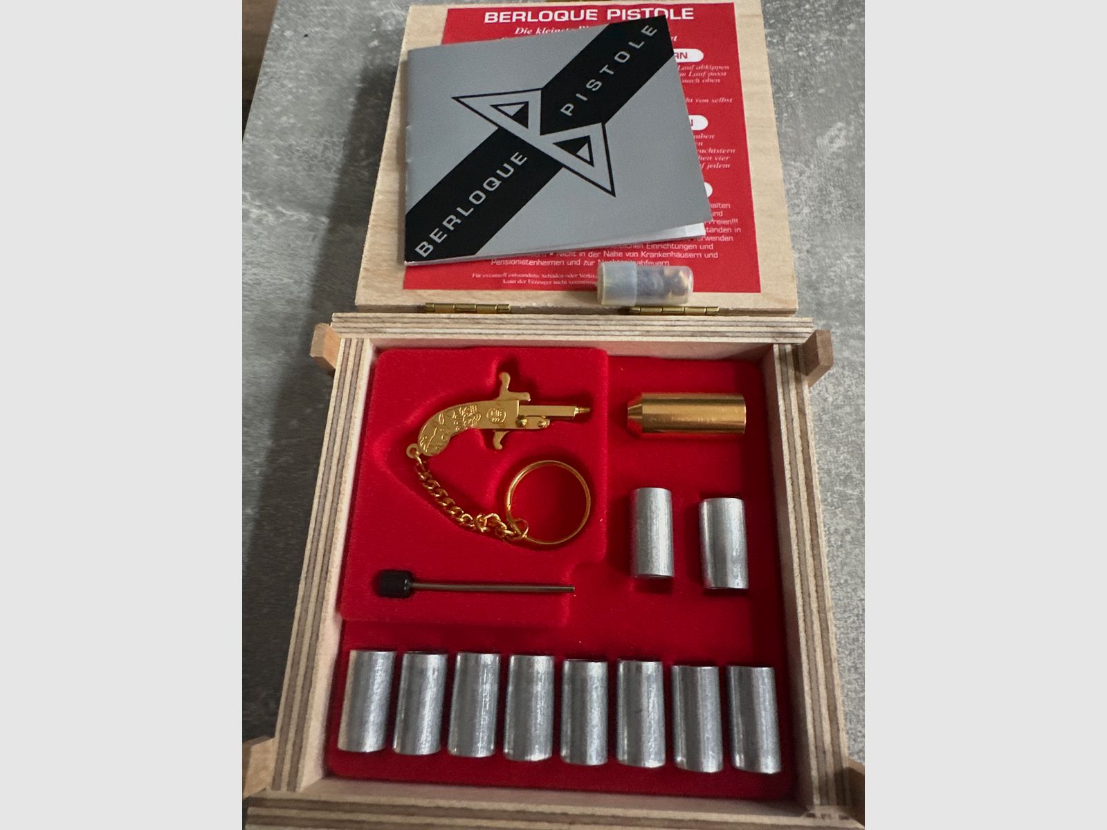 Berloque Revolver und Pistole 