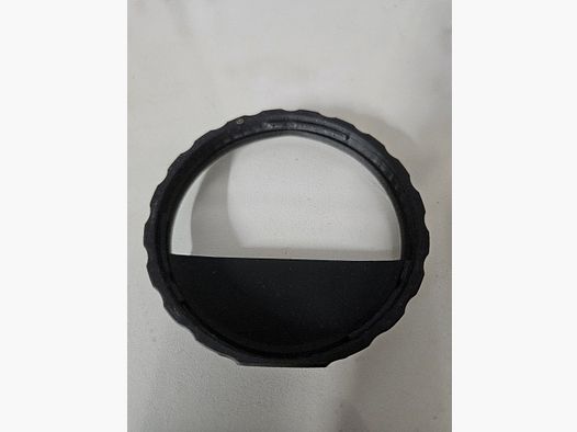 Objective lens aperture sound suppressor anti-reflection