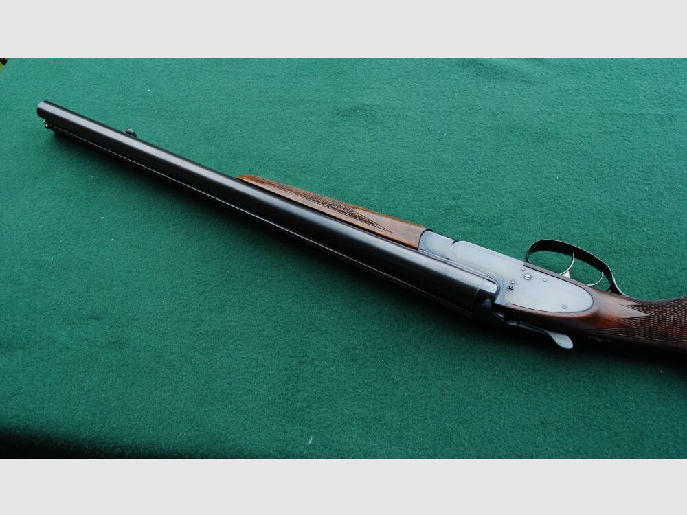 CAS escopeta de caza, auténticos cerrojos laterales, sin extractores, seguro manual.