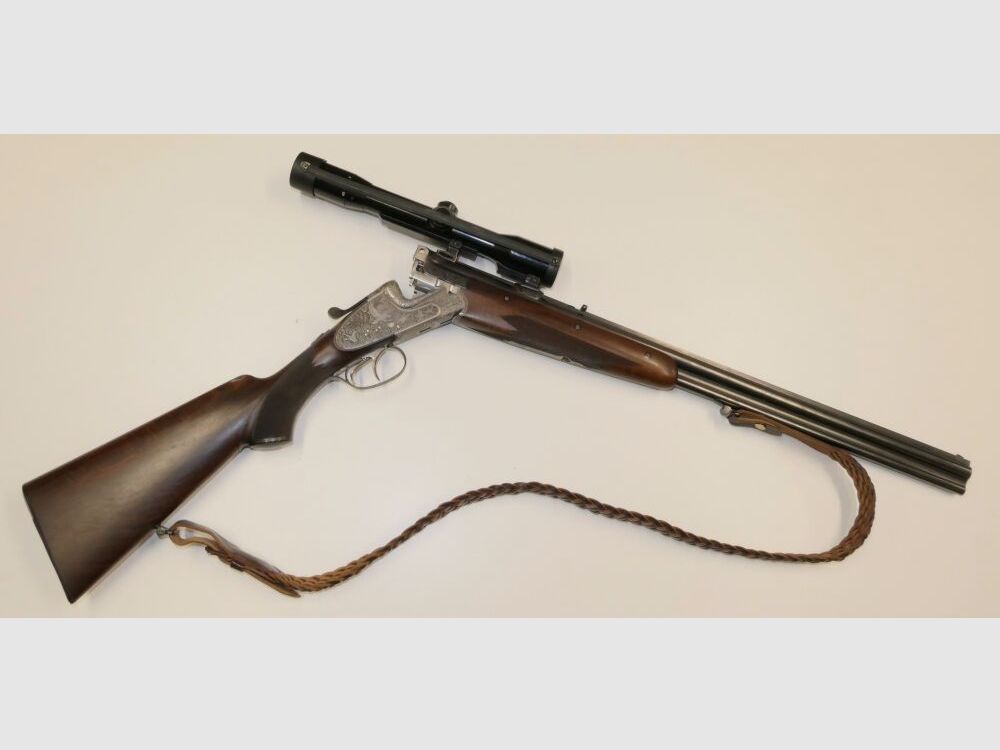 Merkel E313 mit jagdlichen Tiergravuren