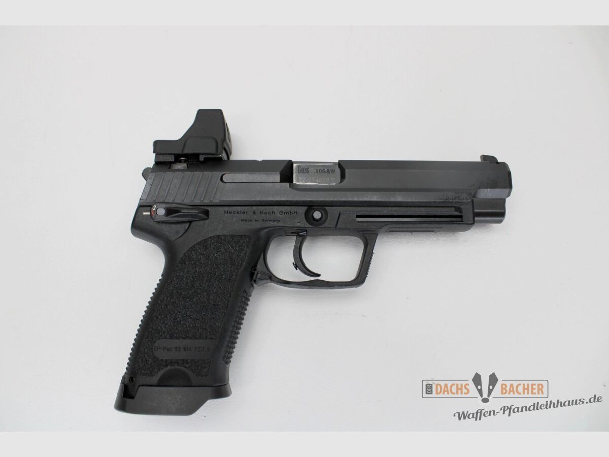 Pistol H&K HK USP EXPERT caliber .40S&W with Vortex Defender CCW and case
