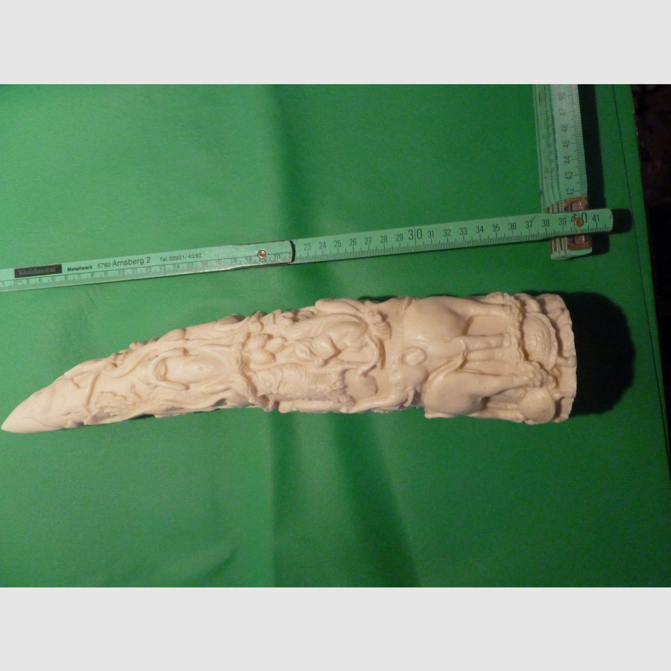 Carved elephant tusk made of resin