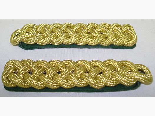 Intreccio della spalla 8-arcato - filato metallico dorato
