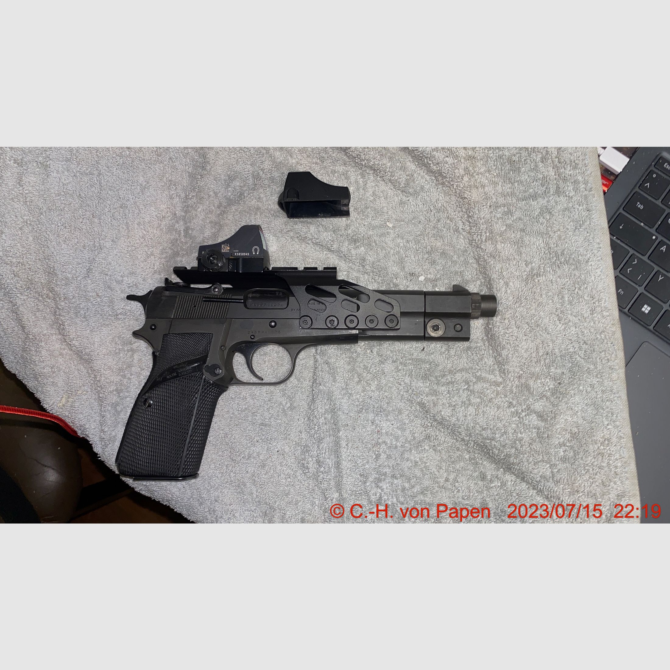 Browning FN HP Competition pistol with 6" barrel caliber 9mm Luger & spare magazine 17 rounds