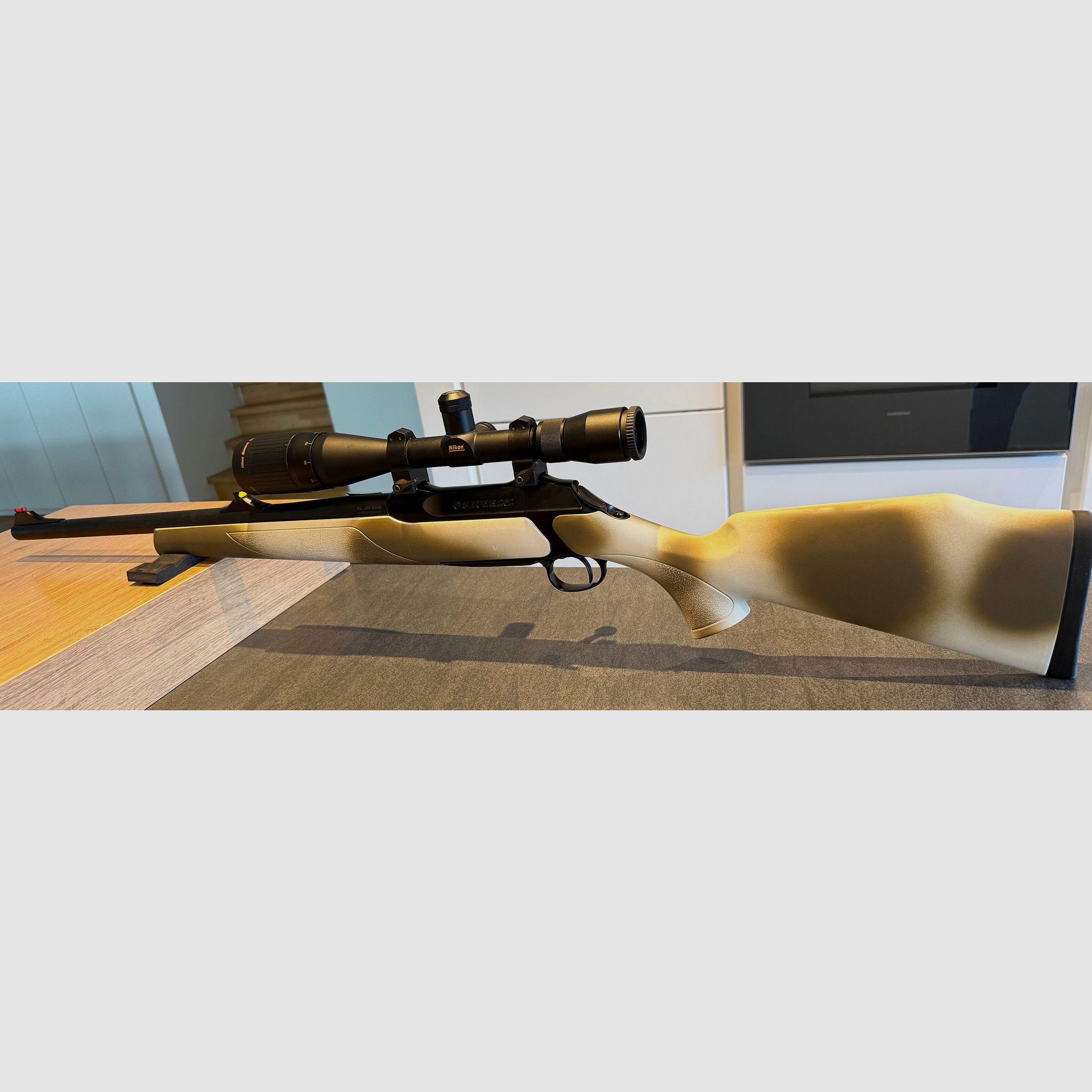 Sauer 202 bolt-action rifle in caliber .308 Winchester with Nikon Monarch UCC 6.5–20× scope