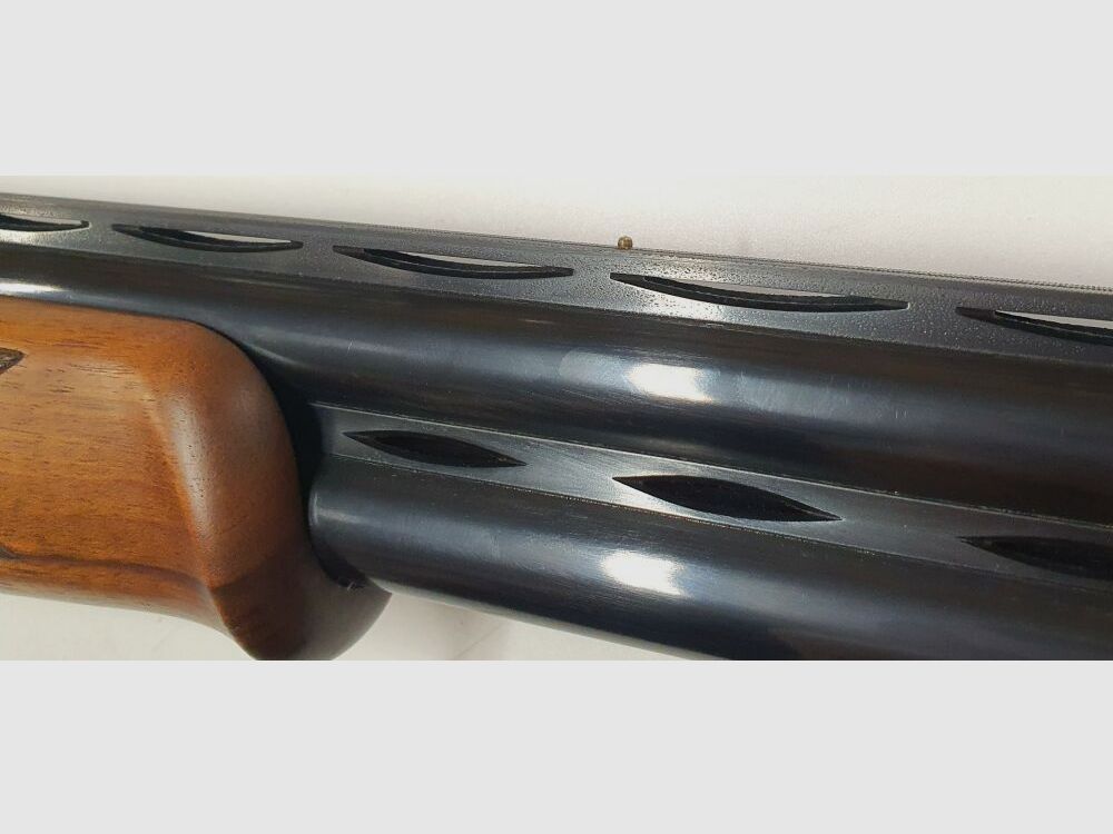 A.V.Maroccini trampa de bosque con grabados muy bonitos en calibre