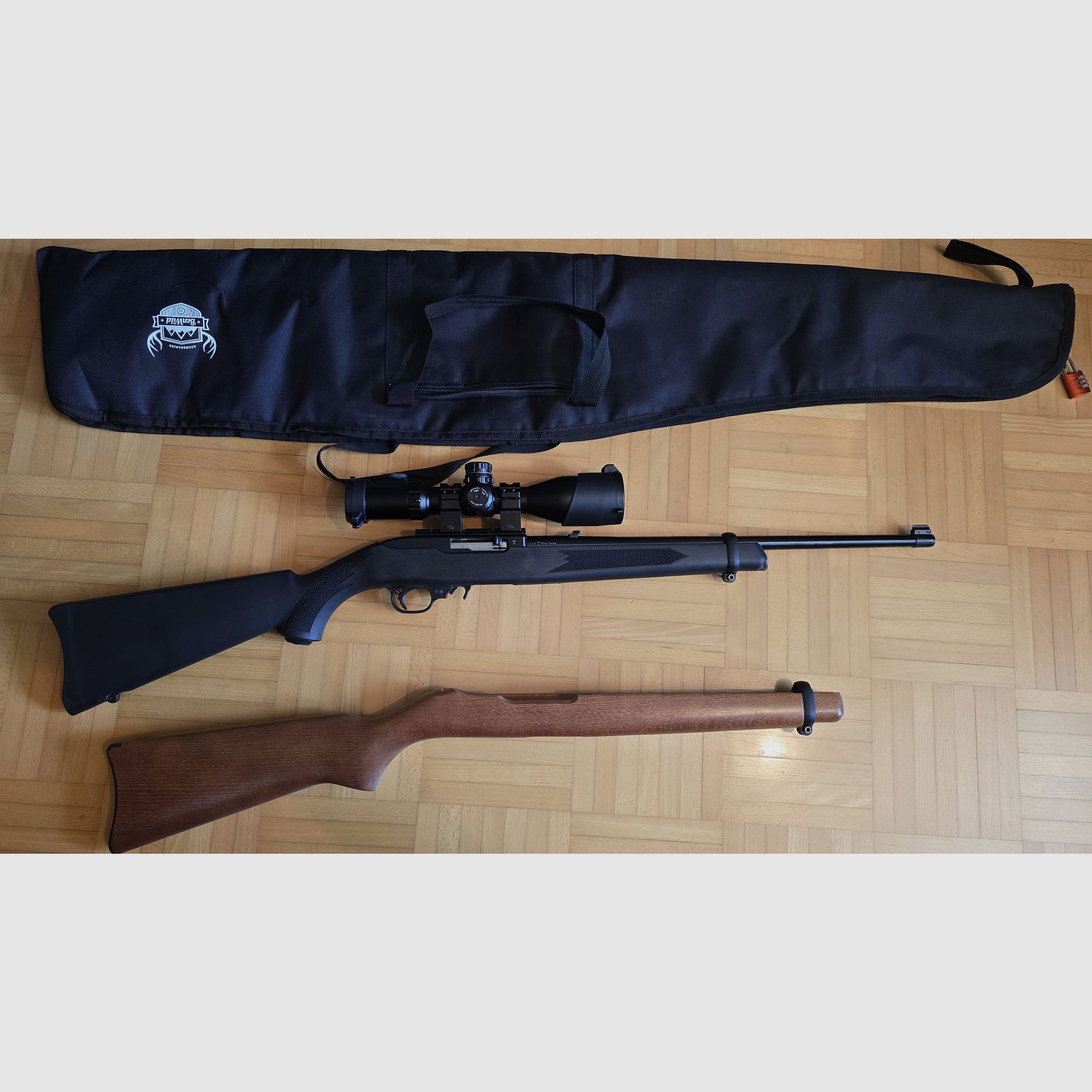 Ruger 10/22 Compact .22lr small caliber long gun. Wooden stock and synthetic stock (interchangeable system) with plenty of accessories