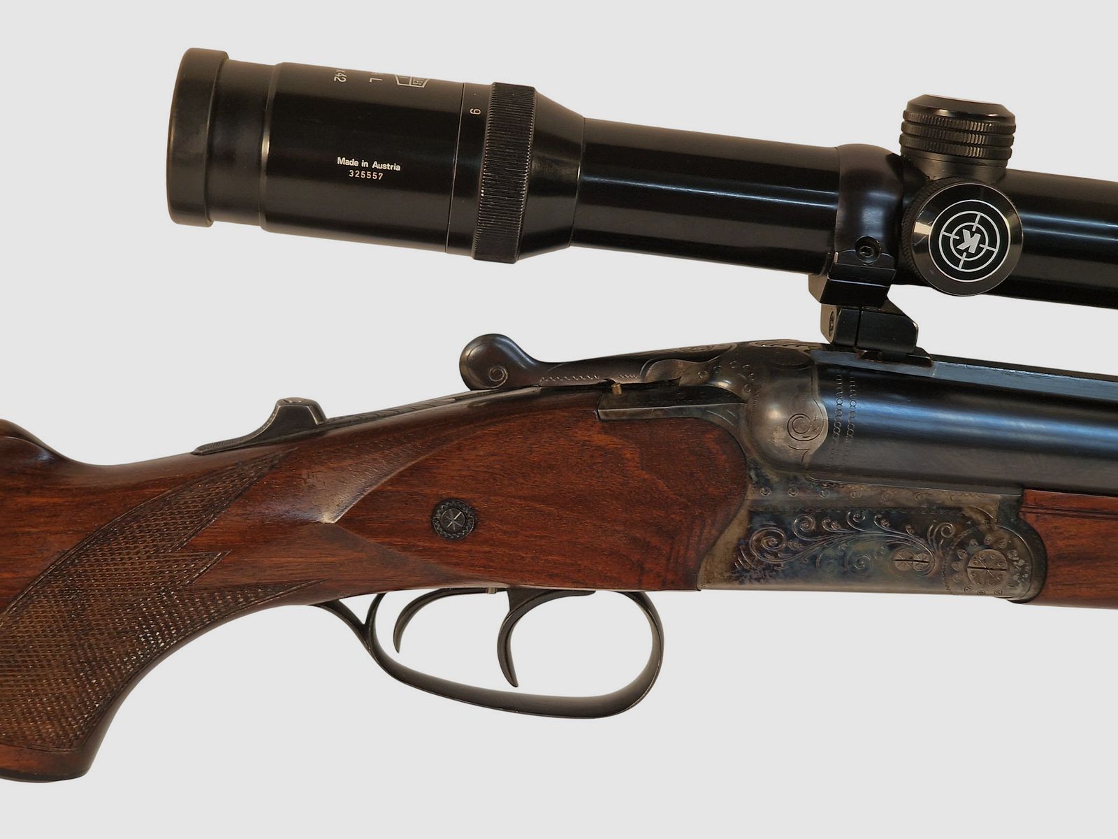 Suhler drilling hardened in caliber .30-06 16/70 22 WinMag with Kahles 2.2-9x42