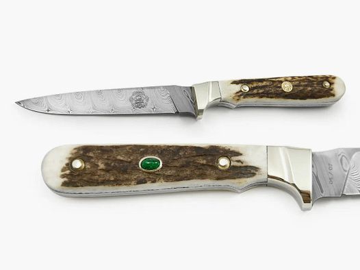 Cuchillo de aniversario PUMA 250, con esmeralda incrustada en oro, limitado a 7 piezas