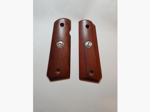 Griffschalen der Colt 1911 oder ME Sport 1911, siehe Bild. 