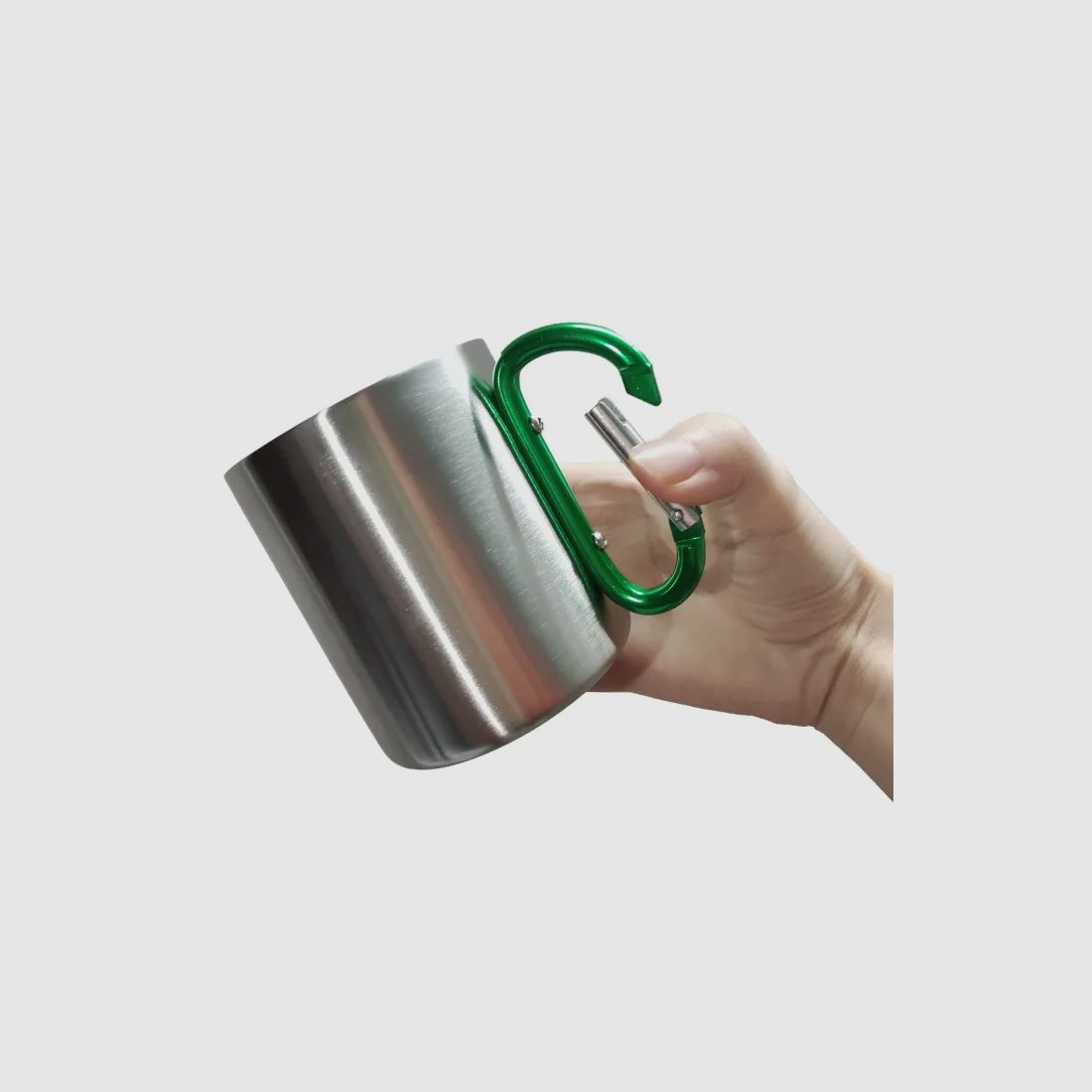Double-walled stainless steel mug with green carabiner handle