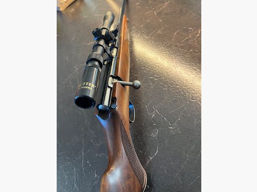 Voehre .22 with Sutter scope. 3-7x20