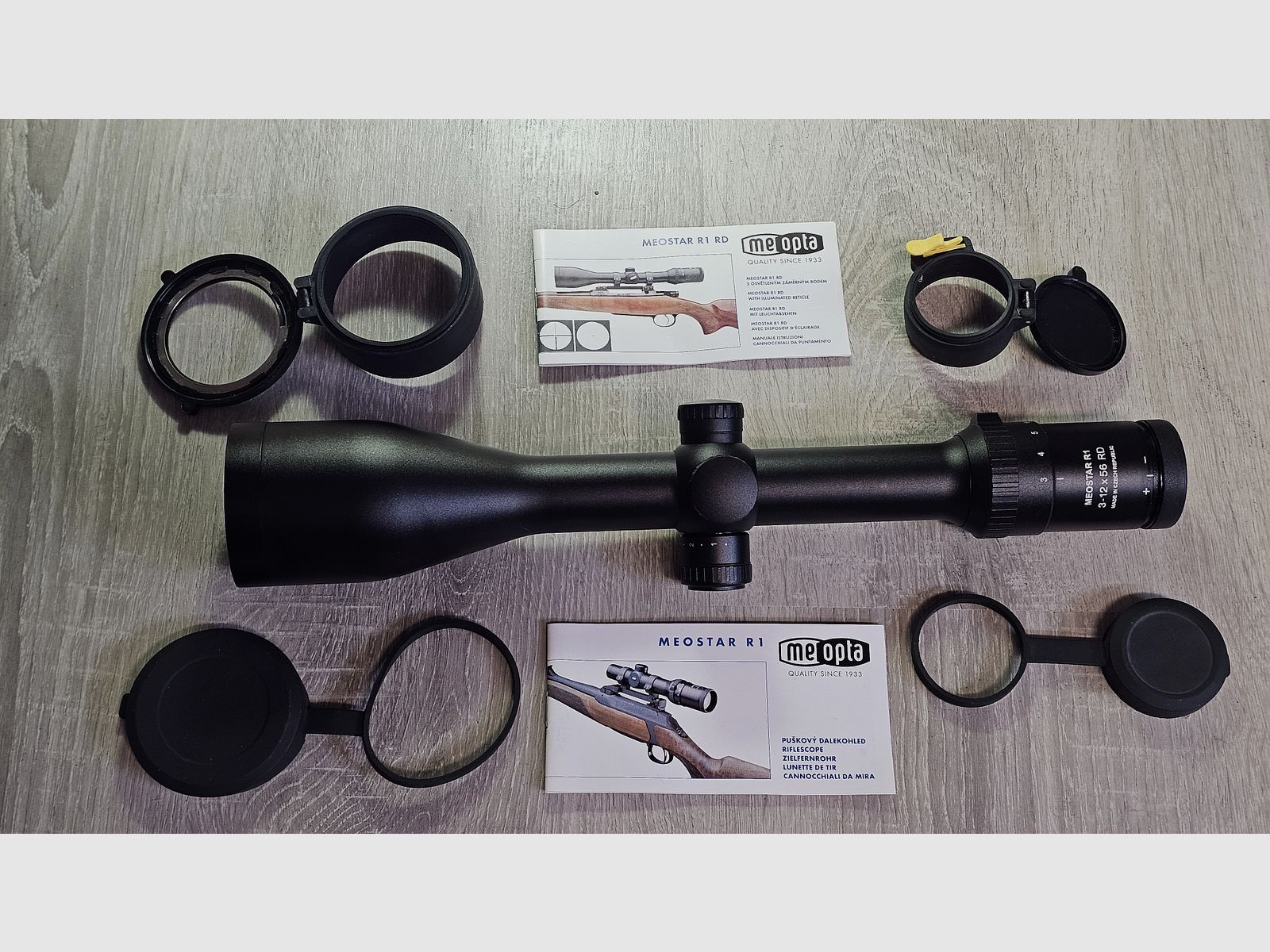 Viseur Meopta MeoStar R1 3-12x56 RD (point lumineux, Abs. 4C) incluant le montage Blaser original (anneaux de 30 mm) et des capuchons Flip-Open