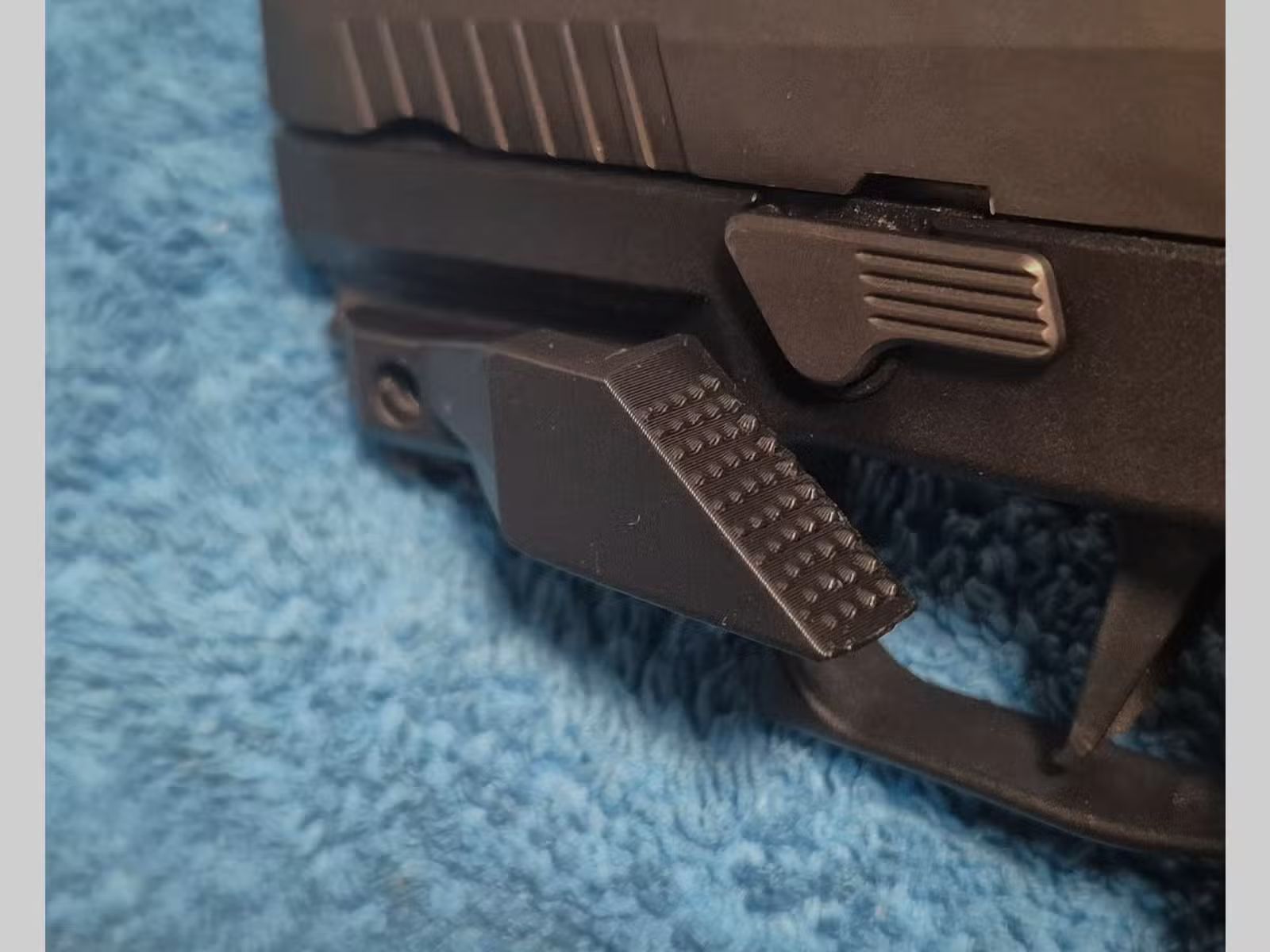 MUNITEX Thump-Rest Auflage / Daumenauflage für Pistolen mit Picatinny-Schiene