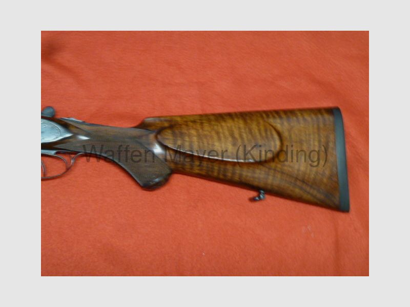 Fusil à double canon avec serrure latérale Suhl