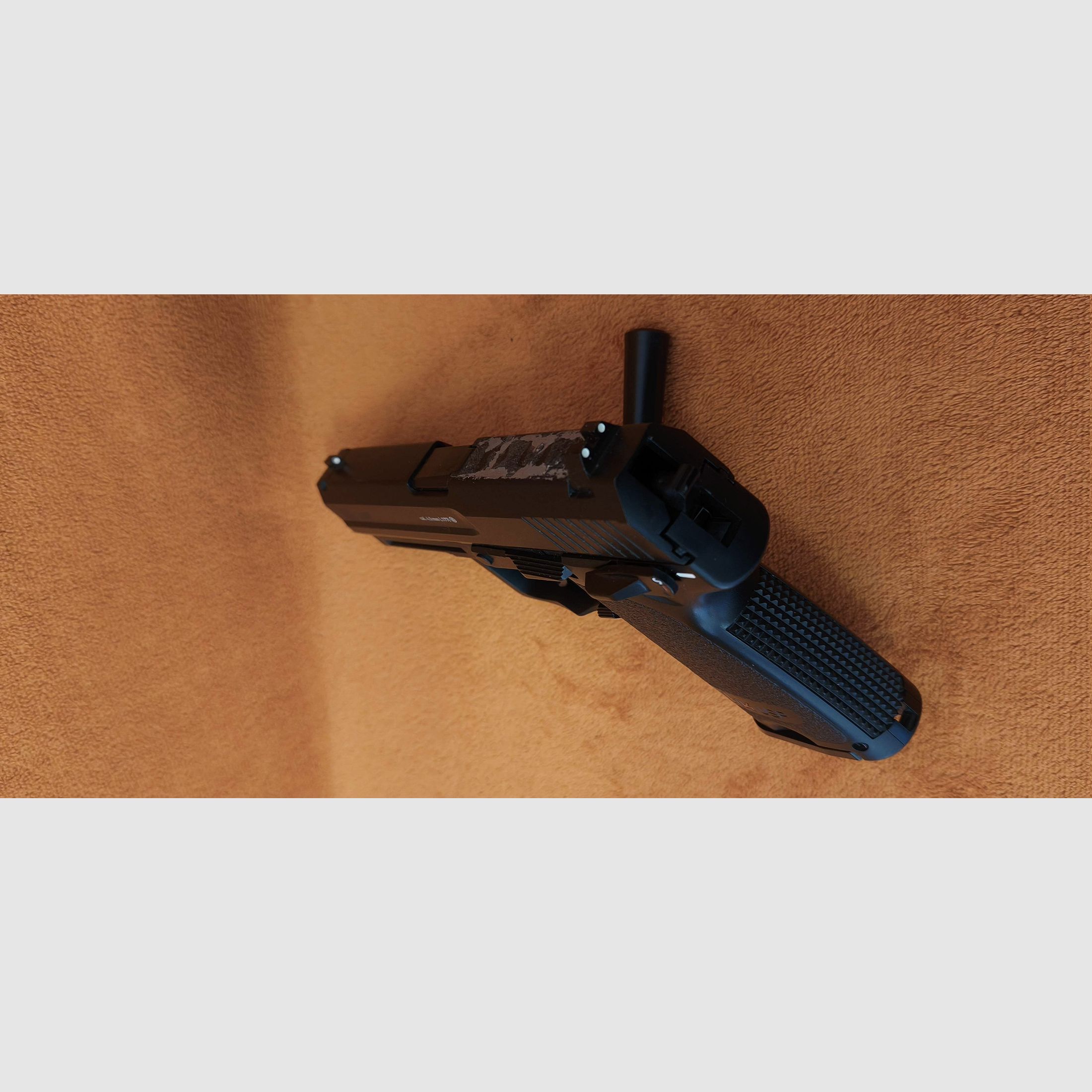 HK USP CO2 air pistol 4.5mm steel BB with signs of use