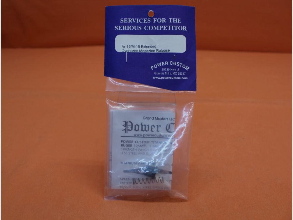 Power Custom AR-15: Oversized Magazine Release Button Power Custom Enlarged Magazine Holder.