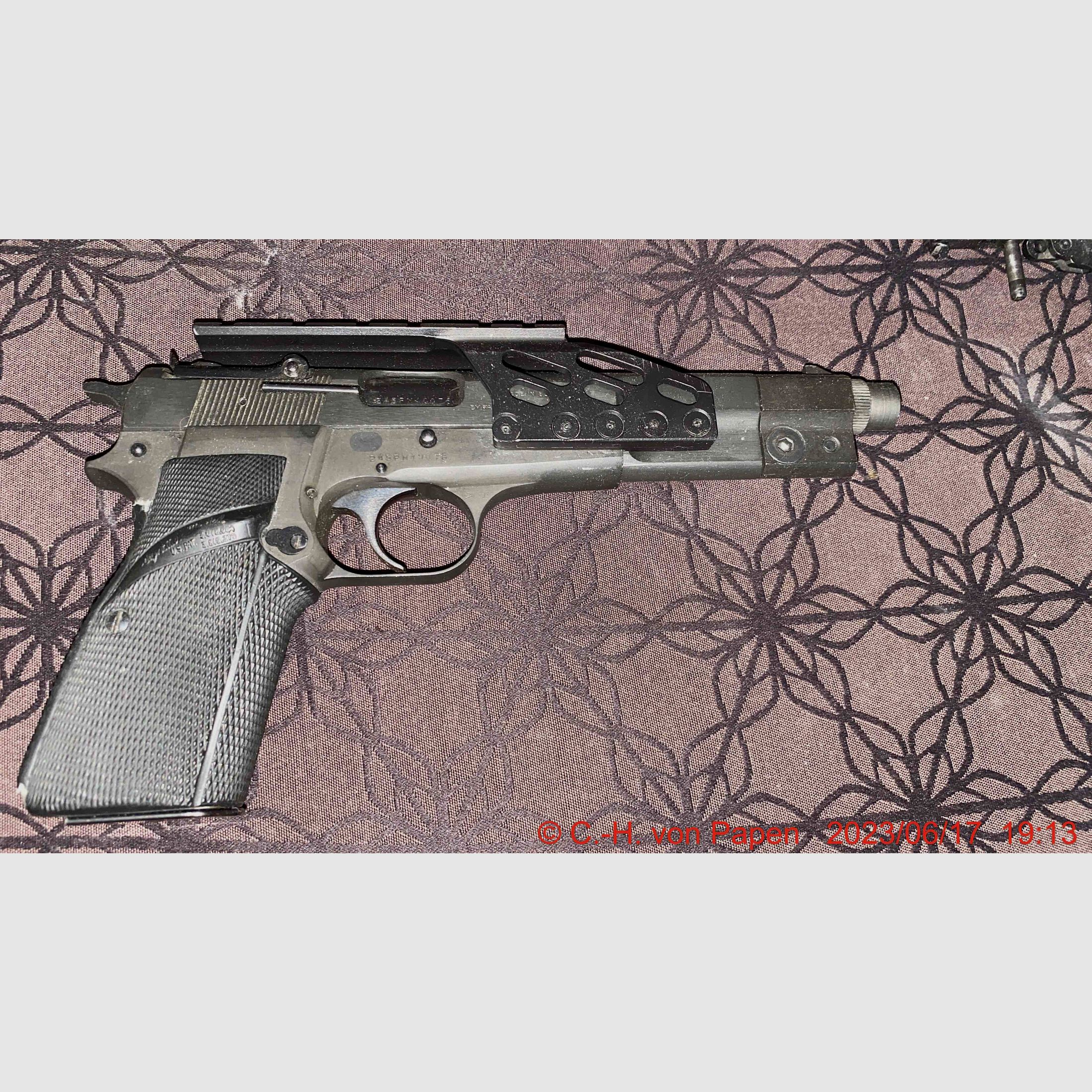Browning FN HP Competition pistol with 6" barrel caliber 9mm Luger & spare magazine 17 rounds