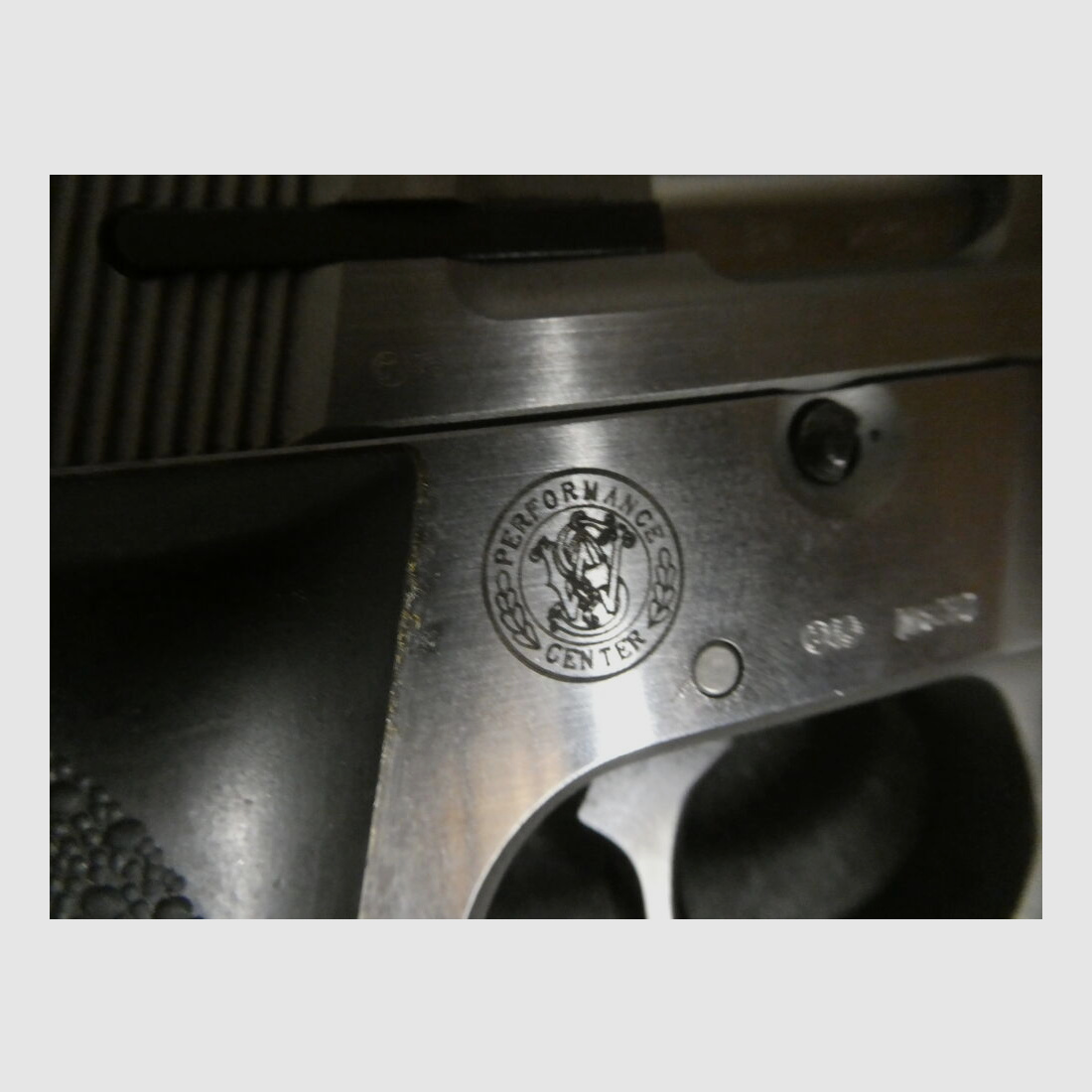 Smith & Wesson	 9 mm Target Champion , Performance Center