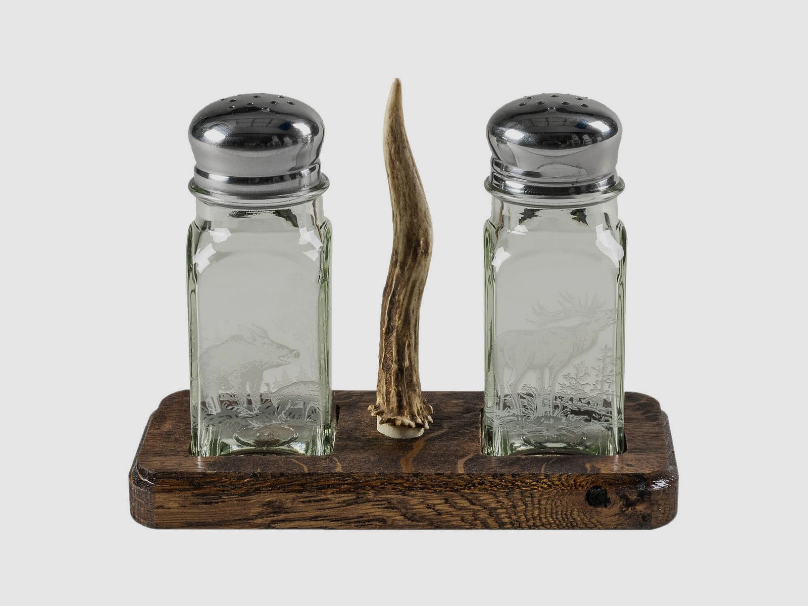 Salt & pepper shaker on oak board with deer stick
