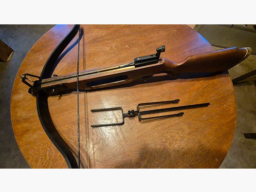 Crossbow met spanhulp