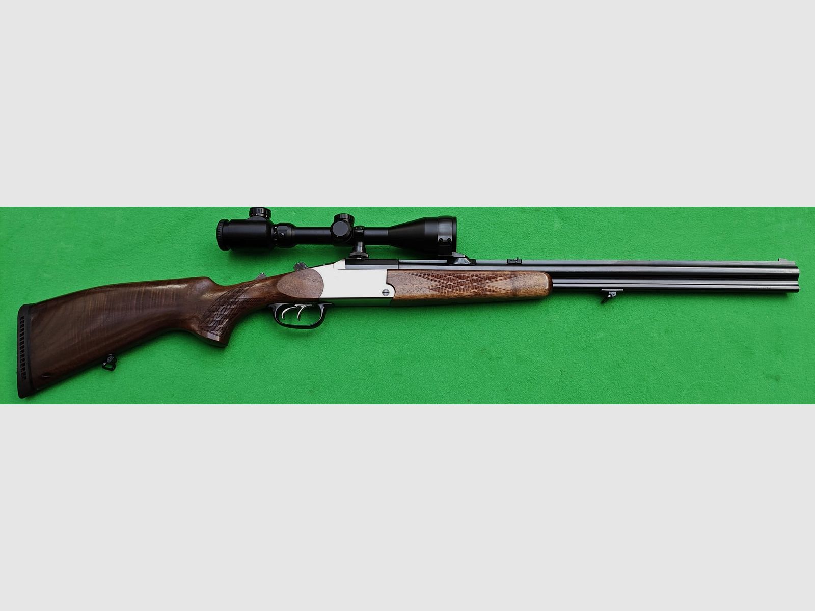 Blaser BBF 95 5,6x50R Mag. 12/70 con visor en montaje oscilante