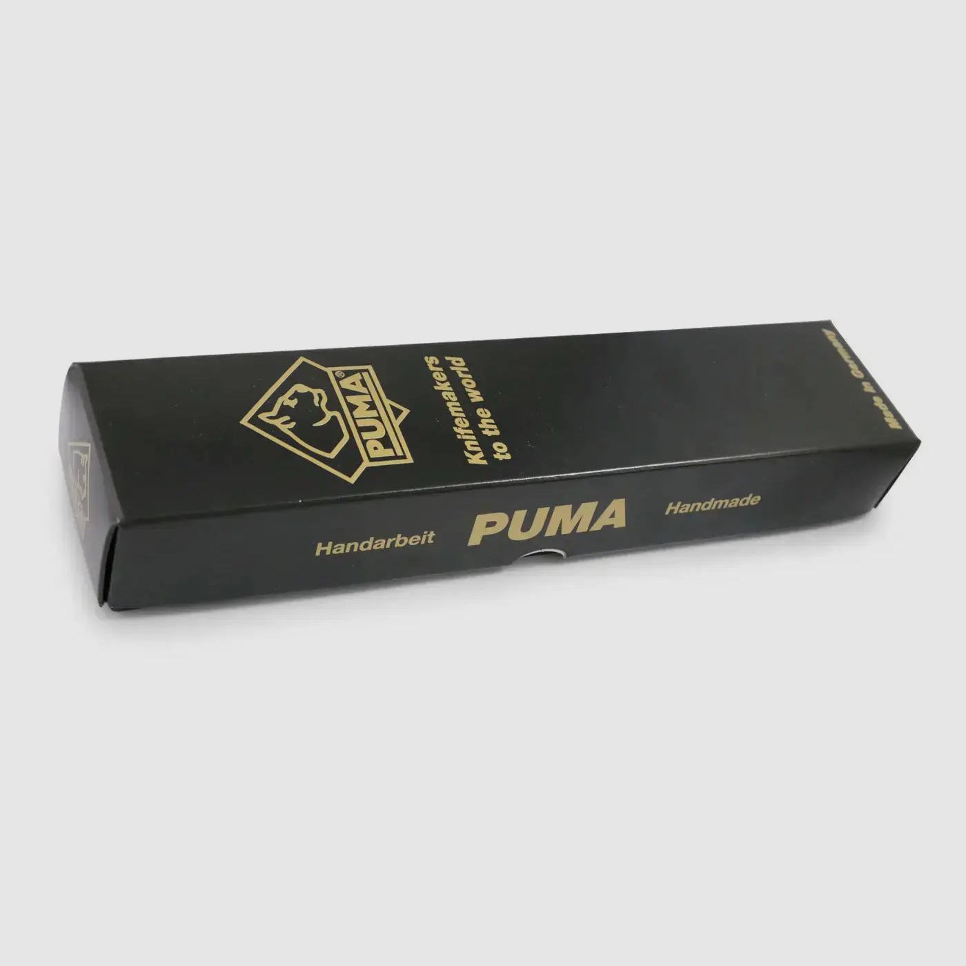 PUMA chasseur blanc, lion