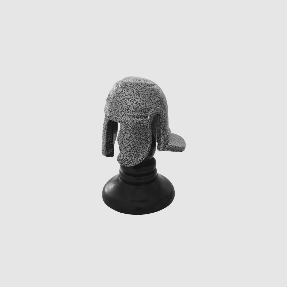 Miniature Roman helmet on stand