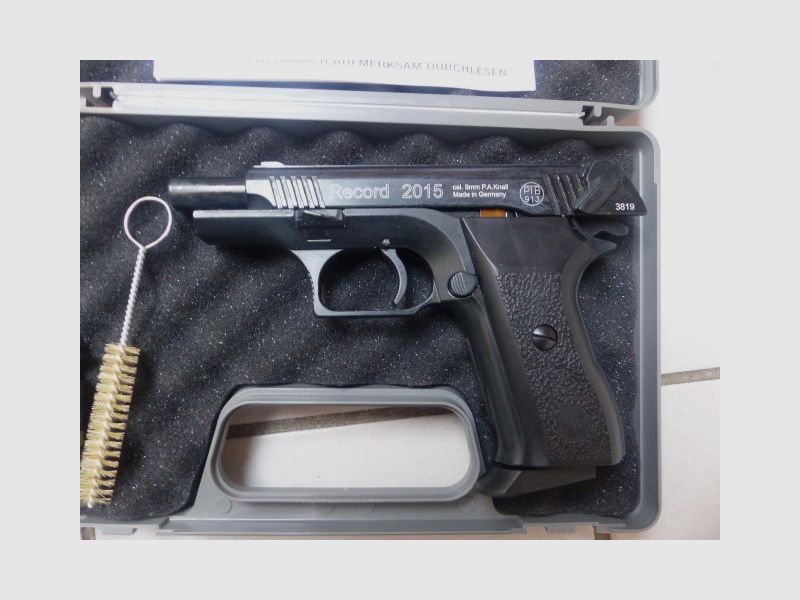 Record 2015 Cal. 9mm PAK New with case, blank firing adapter, brush, manual from collection plus 50 rounds of ammunition