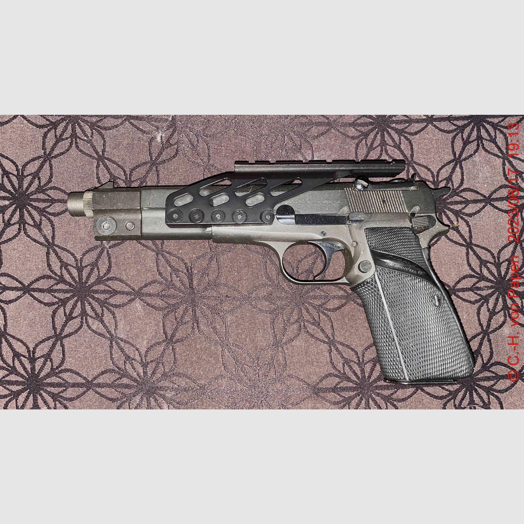 Browning FN HP Competition pistol with 6" barrel caliber 9mm Luger & spare magazine 17 rounds