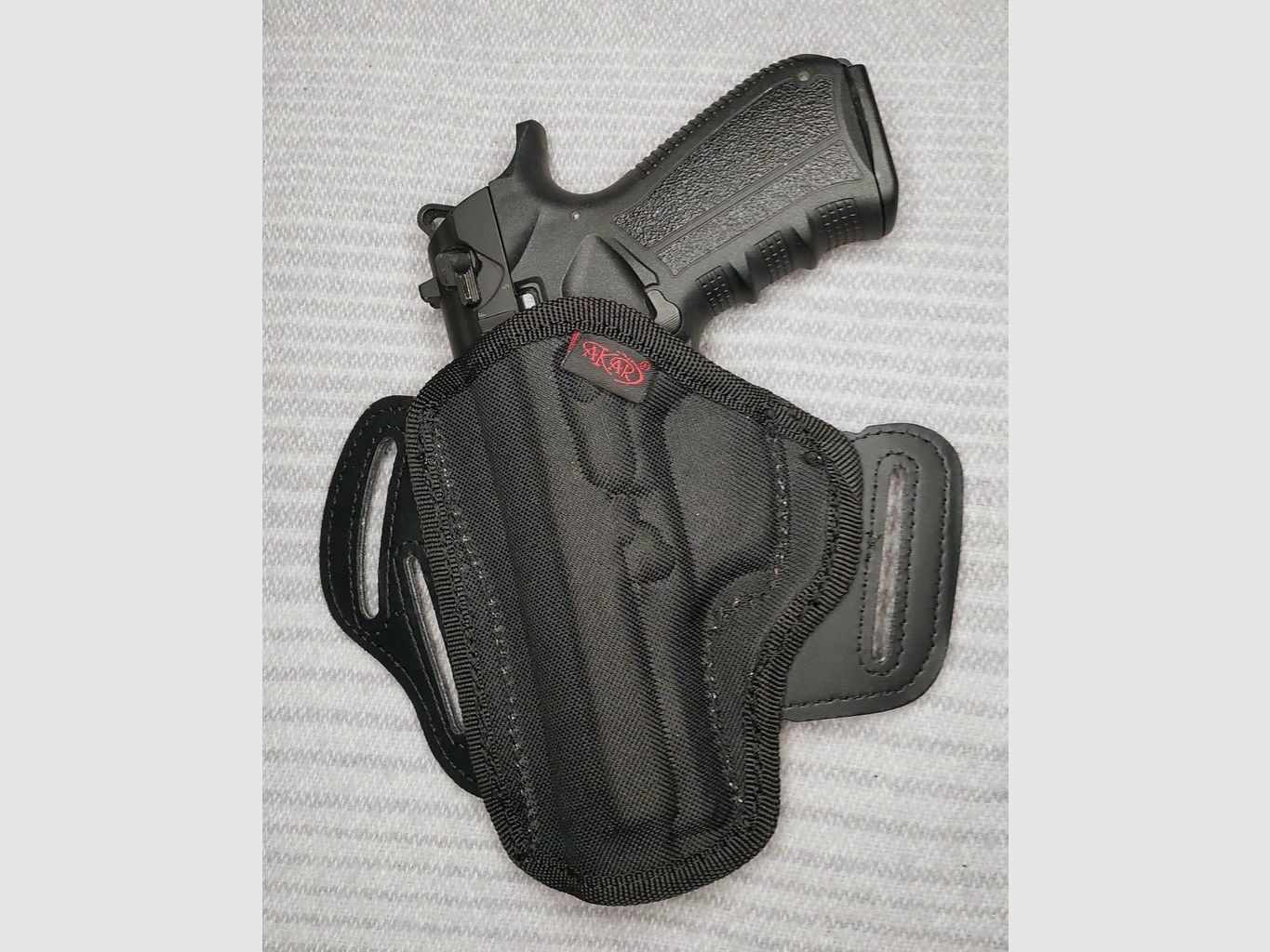 Zoraki 918 9mm P.A.K. schwarz (PTB 1024) mit zwei Magazinen (1x18er - 1x25er) und neuem First Strike Cordura Holster