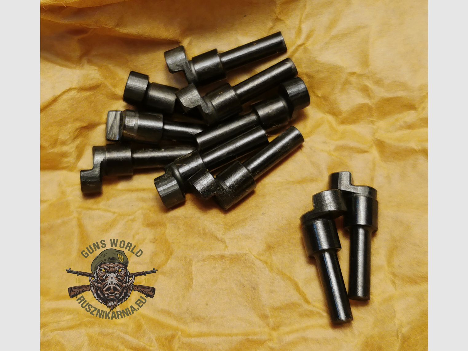 Axe de la barre d’accrochage du chien P-64