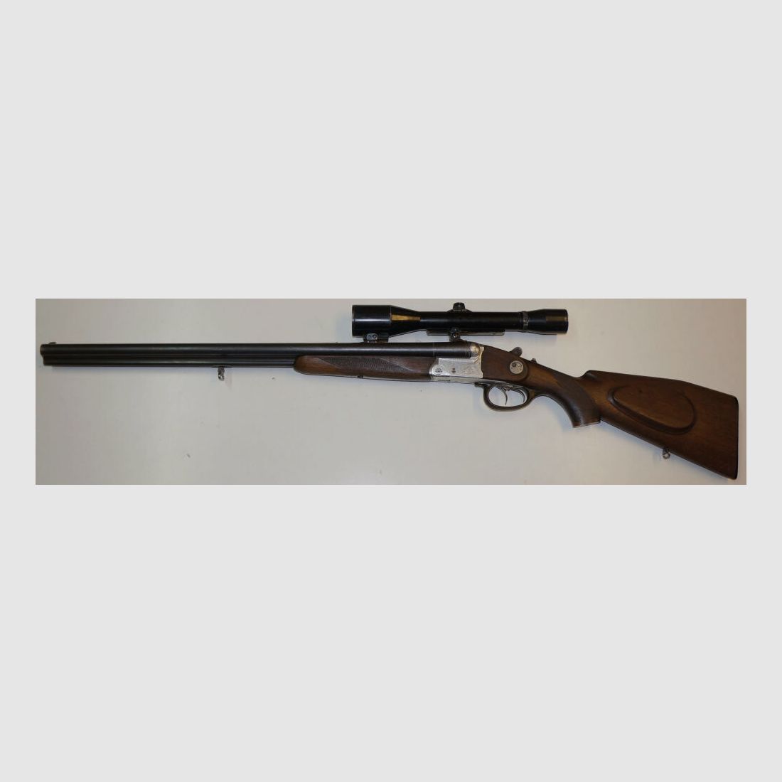 Krieghoff Drilling, Krieghoff, Kal.7x57R / Kal.16/70, mit GECO Zielfernrohr und schönen Gravuren