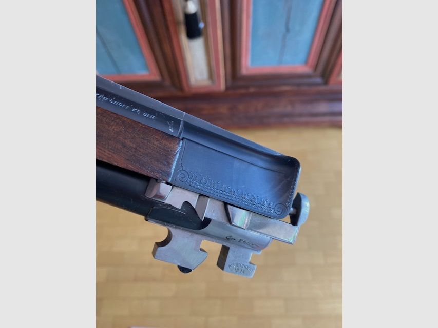 Krieghoff Ulm Modelo Ulm Cerrojo lateral Holland & Holland escopeta de doble cañón con cañón intercambiable 6,5x57R 20/76 Magnum 16/70 16/70 en maletín en excelente estado BBF BDF