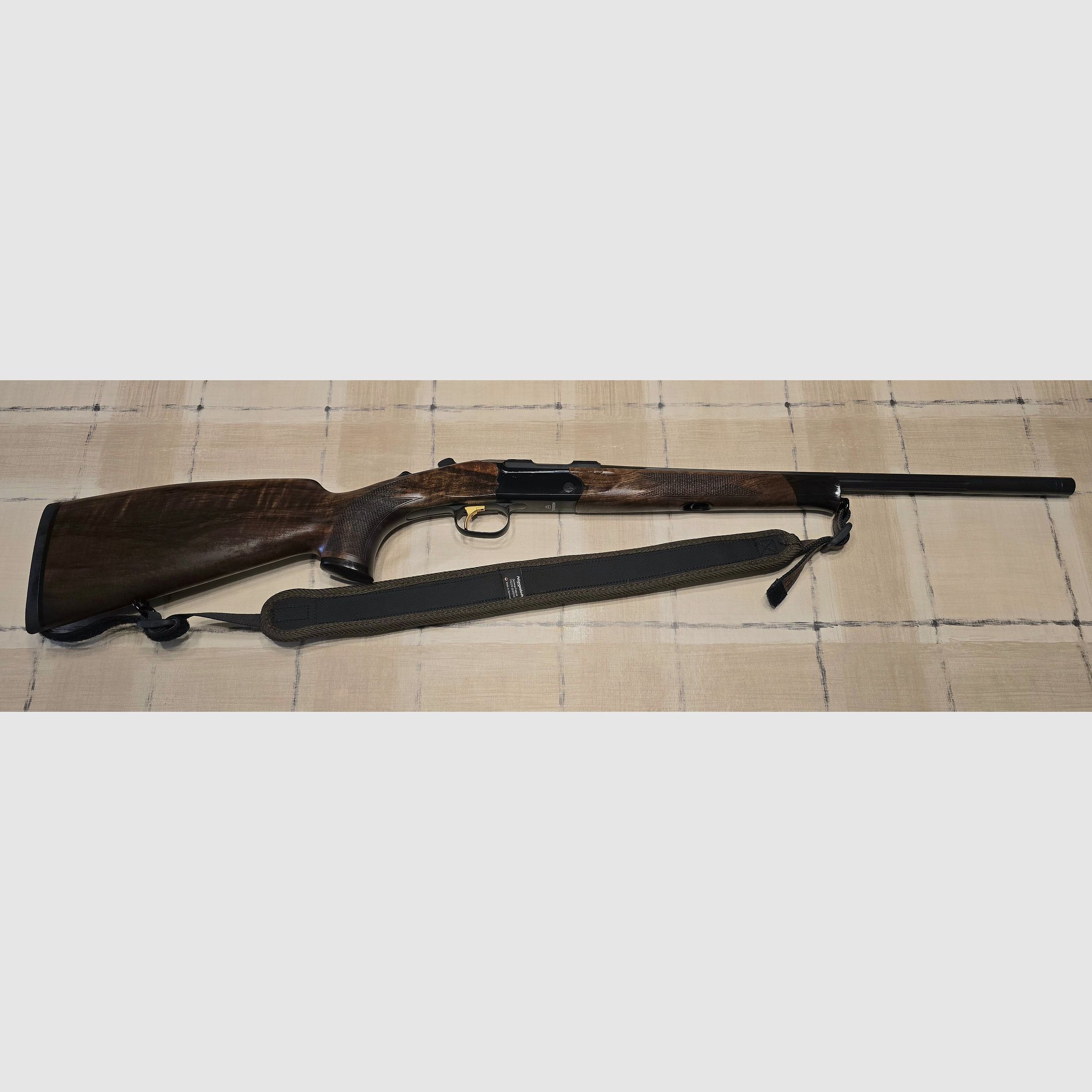 Merkel K5 Extrem with ZEISS V8 1.8-14x50 riflescope with rail and VANWARD Hunter PRO, overbarrel titanium suppressor for caliber .30