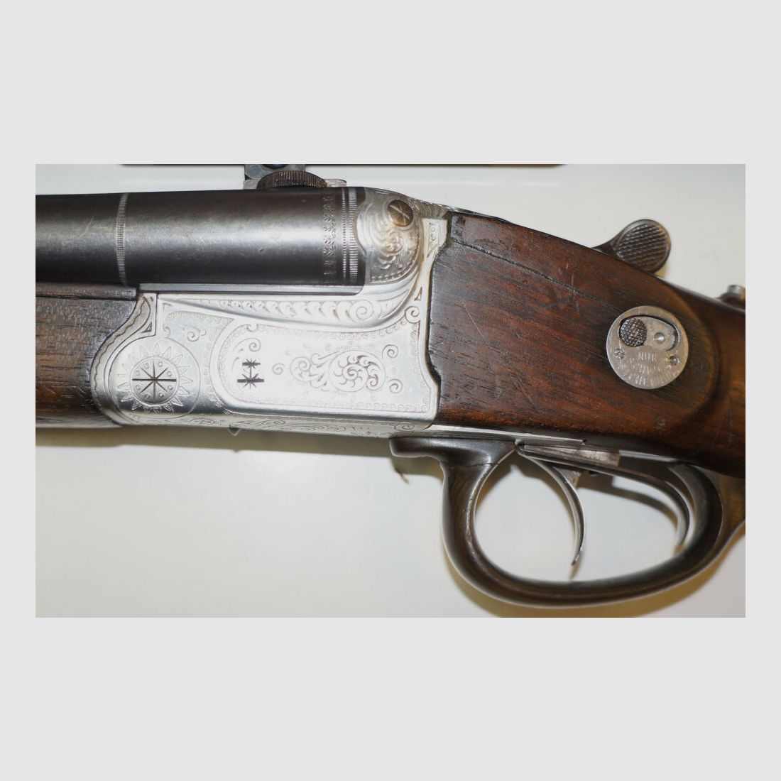 Krieghoff Drilling, Krieghoff, Kal.7x57R / Kal.16/70, mit GECO Zielfernrohr und schönen Gravuren