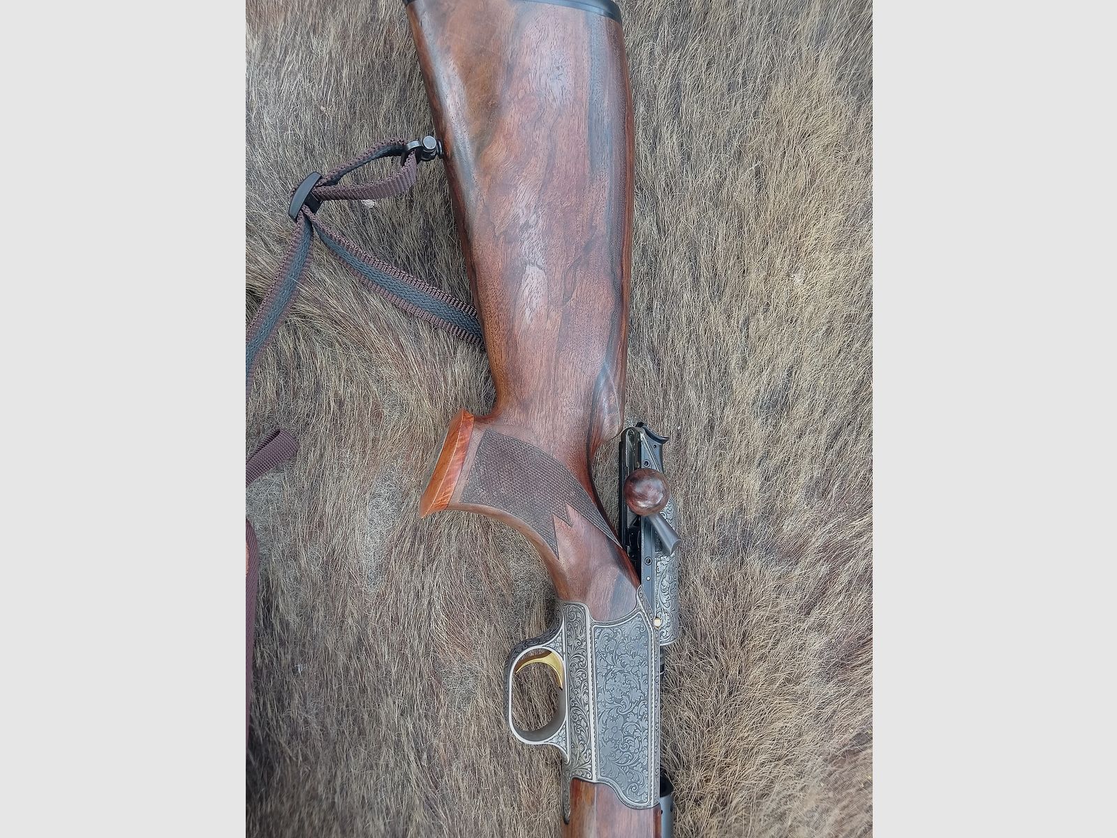 Blaser R93 vollgraviert mit unbenutztem Lauf in 8x68S Holzklasse 9 